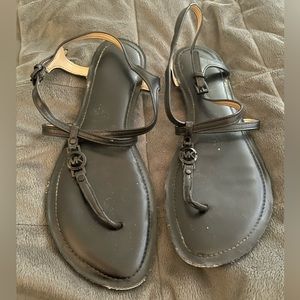 Michael Kors black leather flat sandals. Size 8